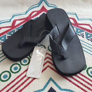 reef cushion butter flip flops